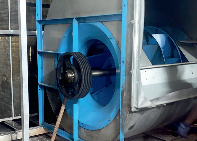 Traditional belt-driven AC fans before renovation